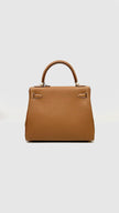 Brand New. Hermes Kelly 25 Gold Togo GHW. KMI686AS|9735