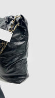 Preowned. Chanel 22 Black Calfskin Large GHW. PTCKJEA8|13481