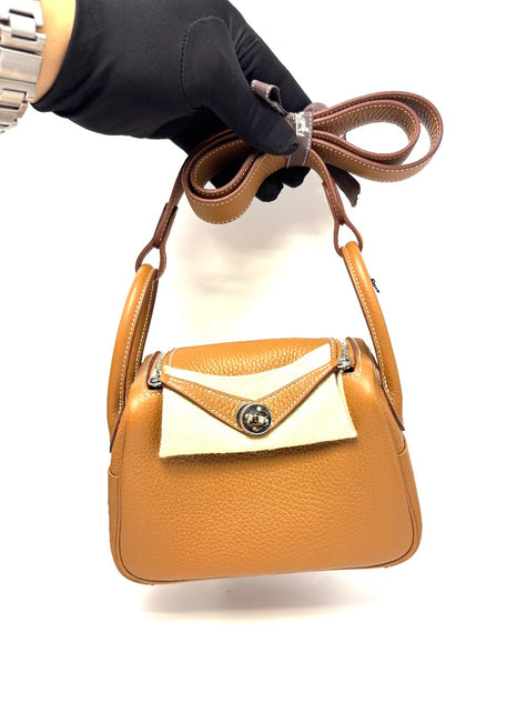 Brand New. Hermes Mini Lindy Gold Clemence PHW. KCT359KW|17988