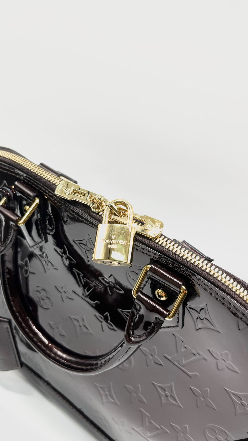 Preowned. LV Alma PM Amarante Monogram Venis Burgundy GHW. FL0181|14746