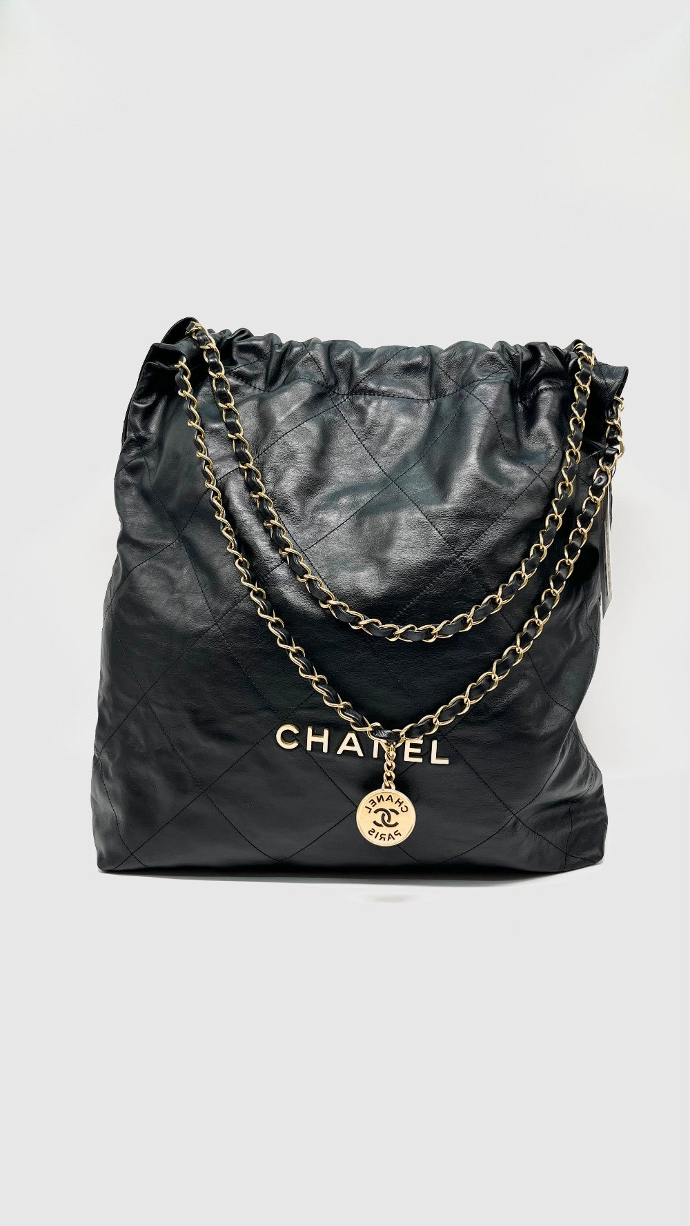 Preowned. Chanel 22 Black Calfskin Large GHW. PTCKJEA8|13480