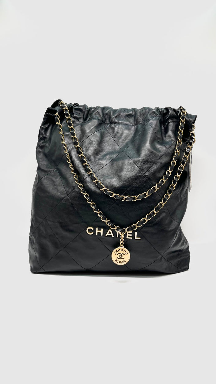 Preowned. Chanel 22 Black Calfskin Large GHW. PTCKJEA8|13480