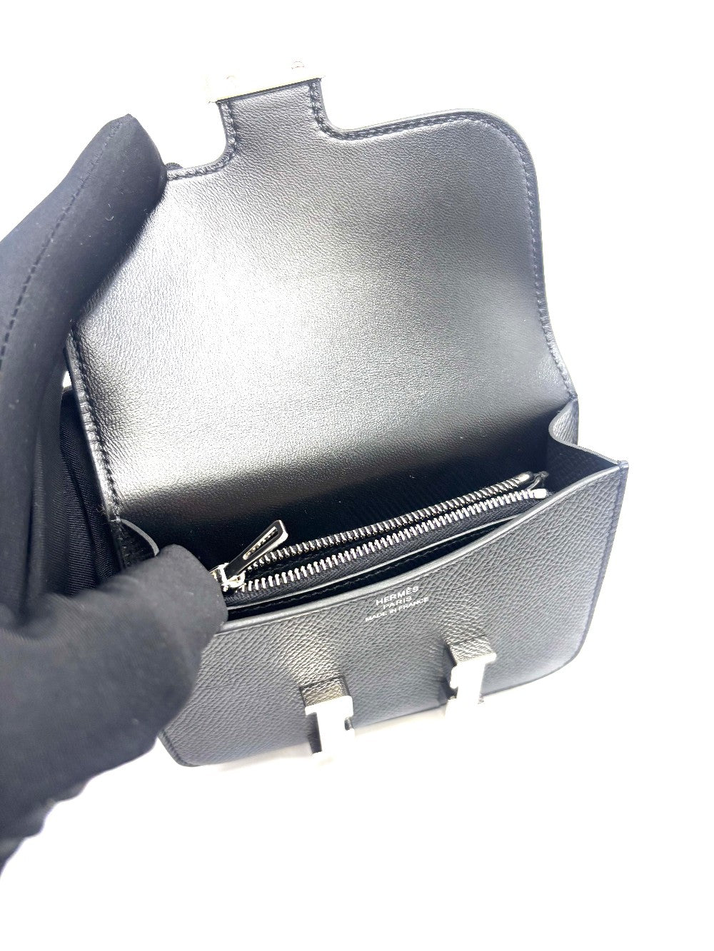 Unused. Hermes Constance Slim Black Epsom PHW. BAM009UH|17877