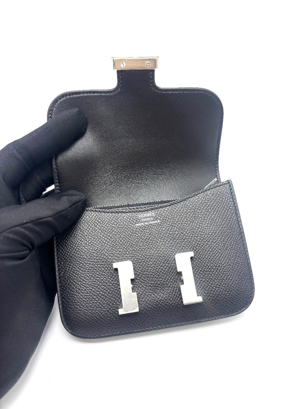 Unused. Hermes Constance Slim Black Epsom PHW. BAM009UH|17872