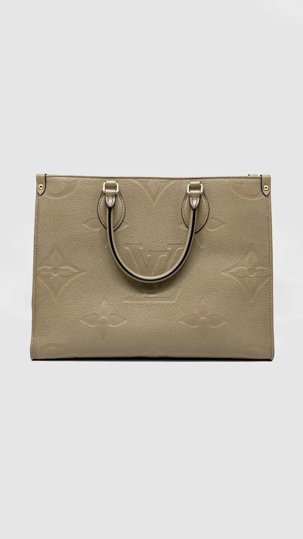 Preowned. LV On The Go MM Empreinte Dove Gray. Microchip|14584