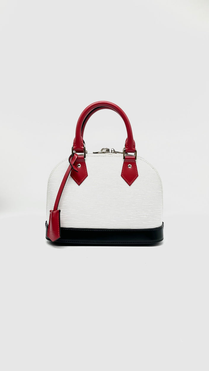 Preowned. LV Alma BB Epi White/Black Red Handle SHW. AA0240|10822