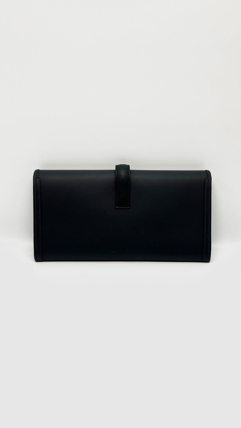 Brand New. Hermes Jige Clutch Blue Nuit/Black. WBY716BD|11922
