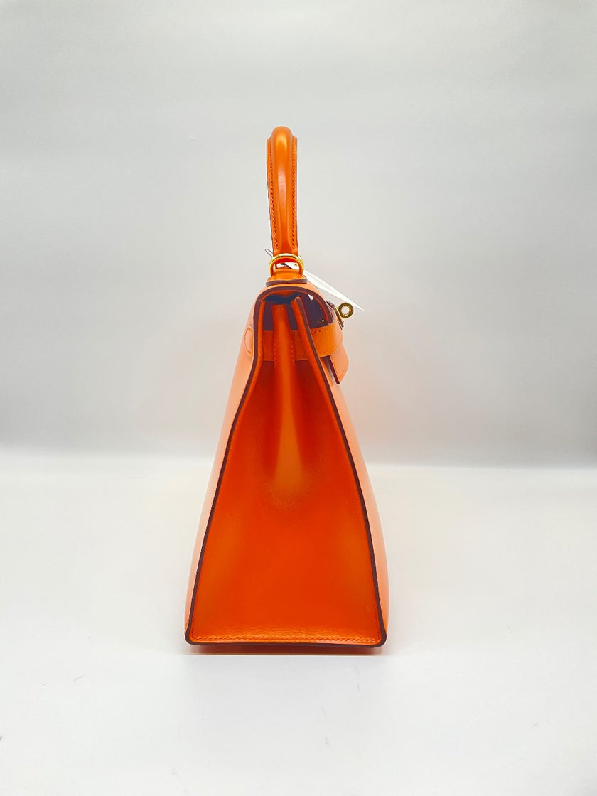 Preowned. Hermes Kelly 28 Orange Box Calf GHW. F Square N21|10067
