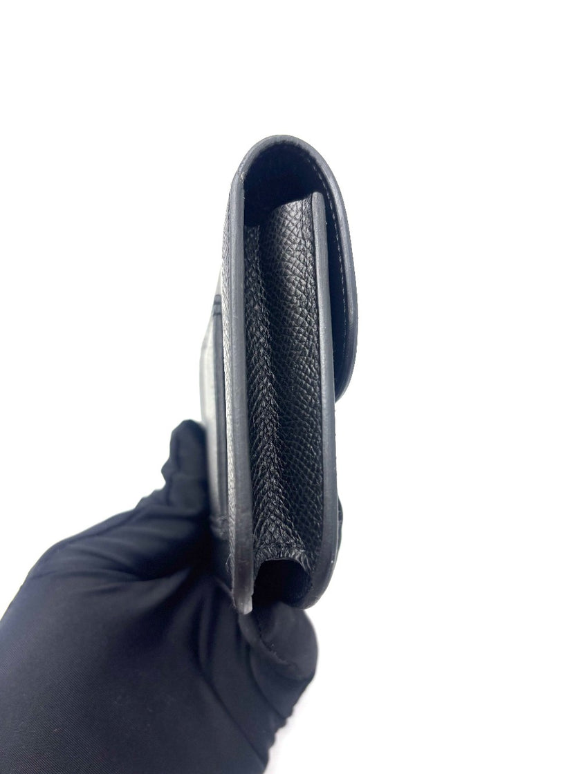 Unused. Hermes Constance Slim Black Epsom PHW. BAM009UH|17873