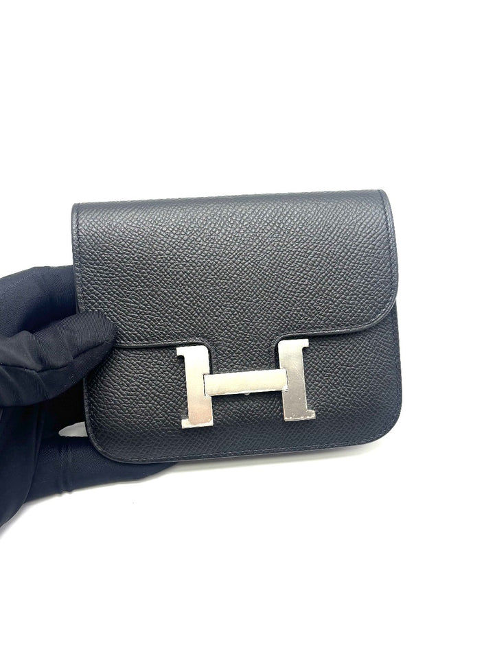 Unused. Hermes Constance Slim Black Epsom PHW. BAM009UH|17871