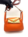 Preowned. Hermes Mini Lindy Orange Togo GHW. ZMM910CA|17820