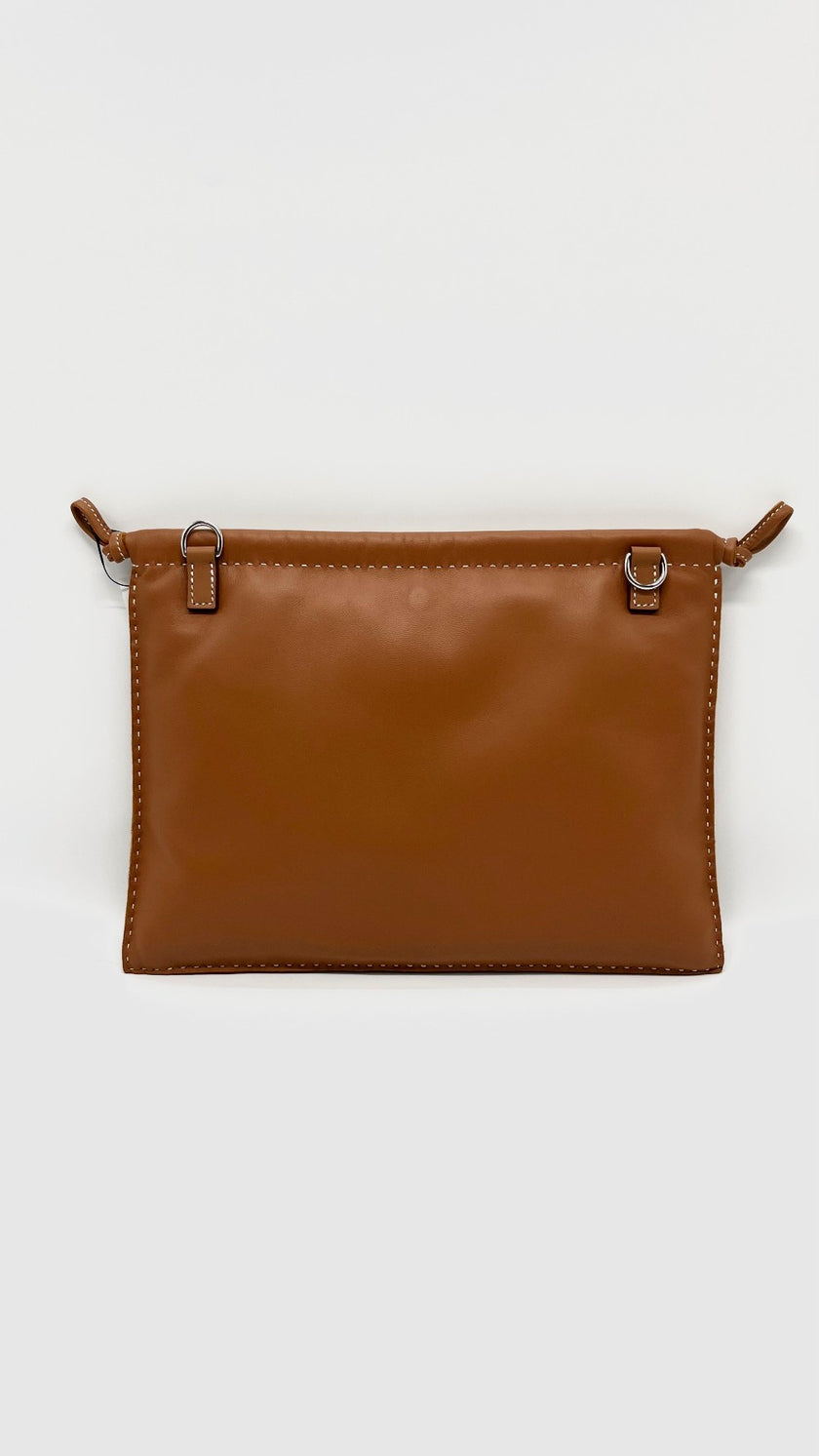 Brand New. Hermes Pilo Pouch Gold Lambskin Swift PHW. KAM004UH|7951