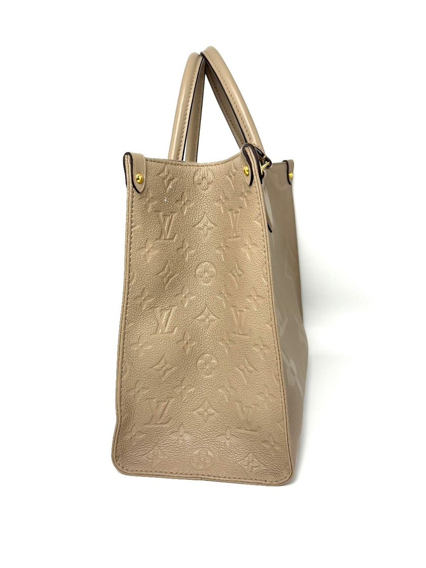 Preowned. LV On The Go MM Dove Gray Empriente. Microchip|8221