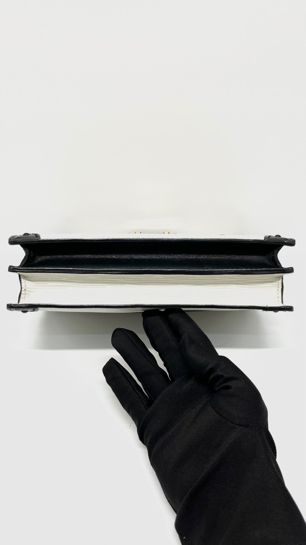 Preowned. LV Epi Trunk Clutch White/ Black GHW. MCHP|15090