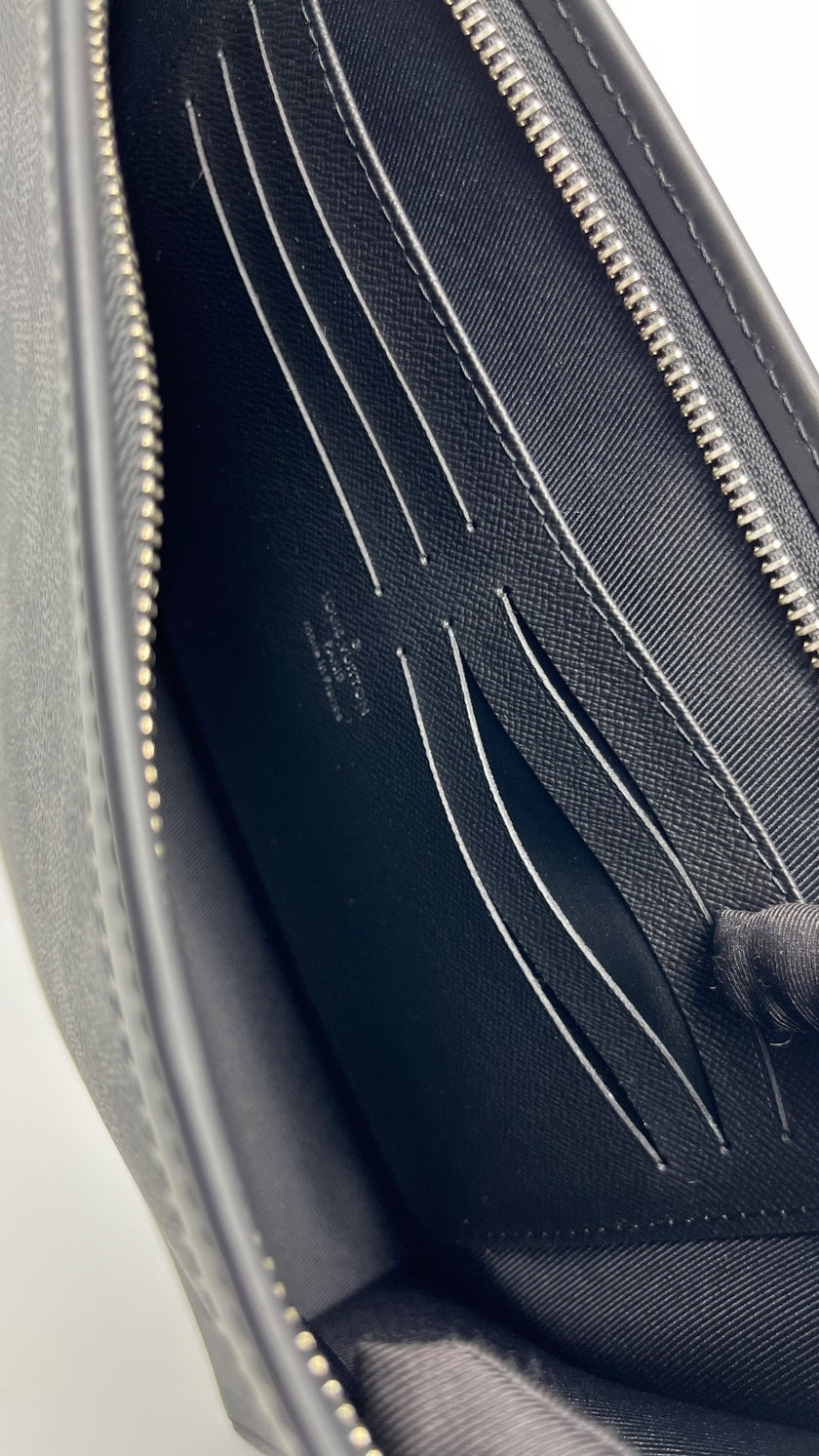 Brand New. LV Voyage Clutch Graphite. TA4129|4873