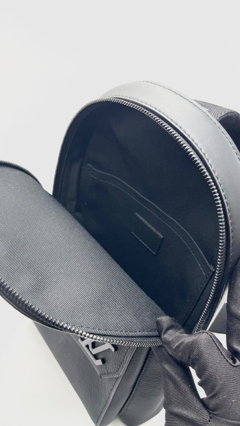 Preowned. LV Pilot Sling Bag Black. Microchip|15529