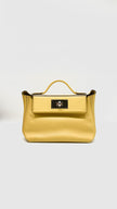 Unused. Hermes 24/24 Mini Sun Evercolor/Veau Swift. BIT105GC|9741