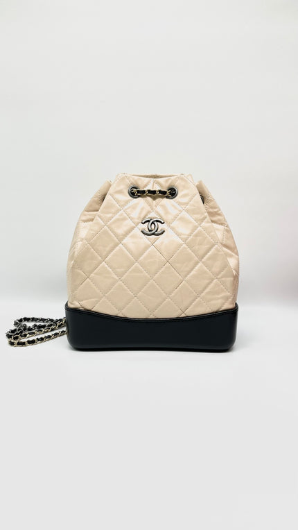 Preowned. Chanel Small Gabrielle Backpack Clafskin Beige/Black Mixed Metal. 25376023|10362