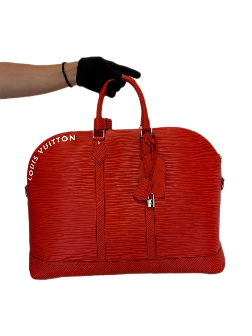 Like New. Lv Alma Epi GM XL Travel Bag Red|17219