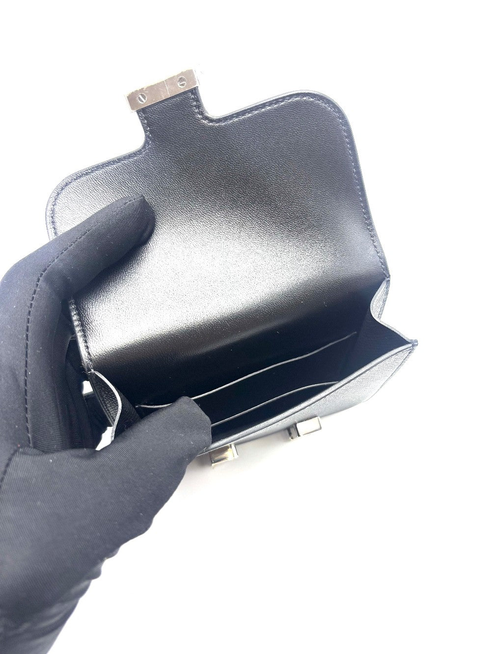 Unused. Hermes Constance Slim Black Epsom PHW. BAM009UH|17875