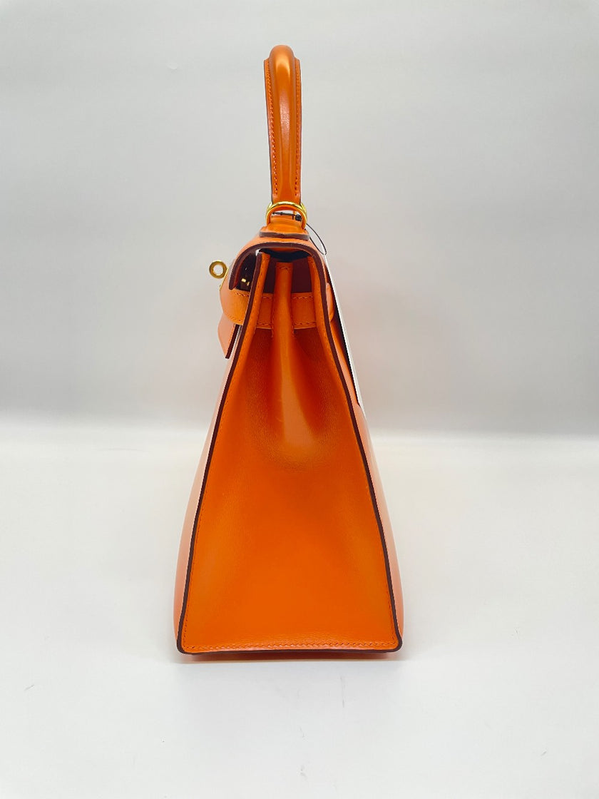 Preowned. Hermes Kelly 28 Orange Box Calf GHW. F Square N21|10066