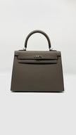 Brand New. Hermes Kelly 25 Etain Epsom Sellier PHW. UNS433AF|6501