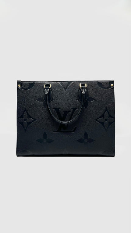 Preowned. LV On The Go MM Black Empriente. MCHIP|8561