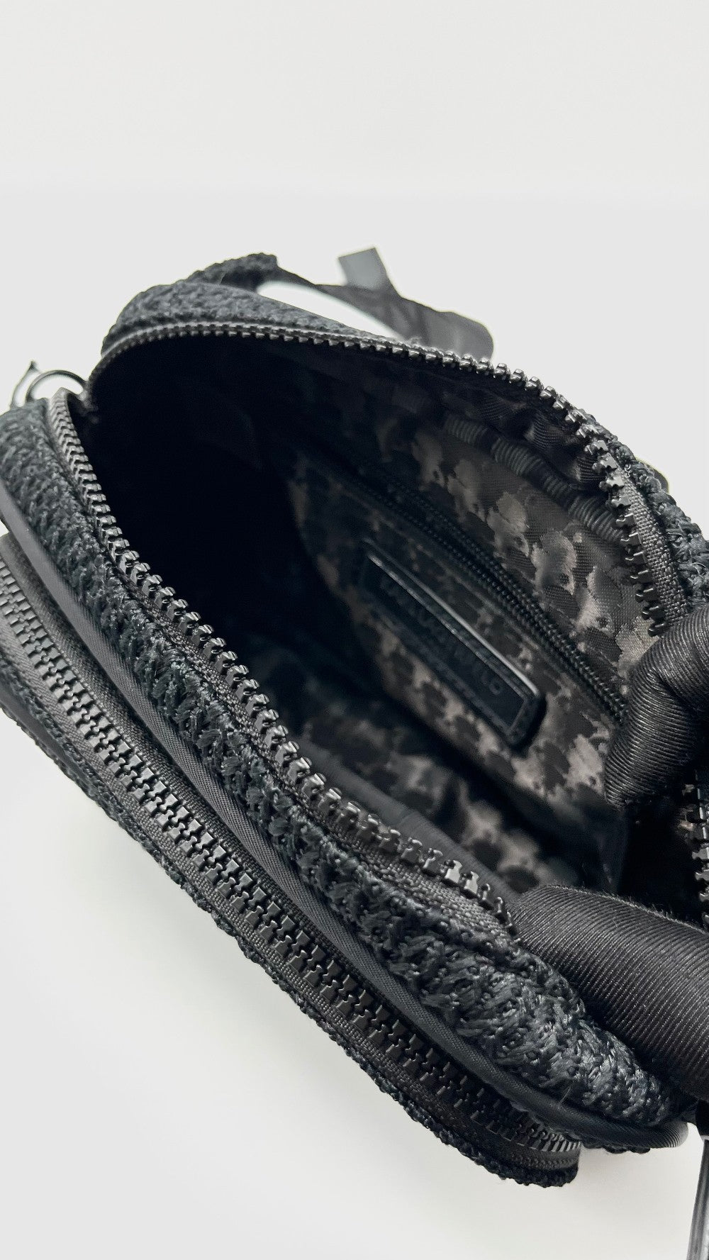 Brand New. Karl Lagerfeld Paris Voyage Knit Belt Black Bag|12015