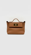 Brand New. Hermes 24/24 Mini Gold Evercolor GHW. KHA099SC|13050