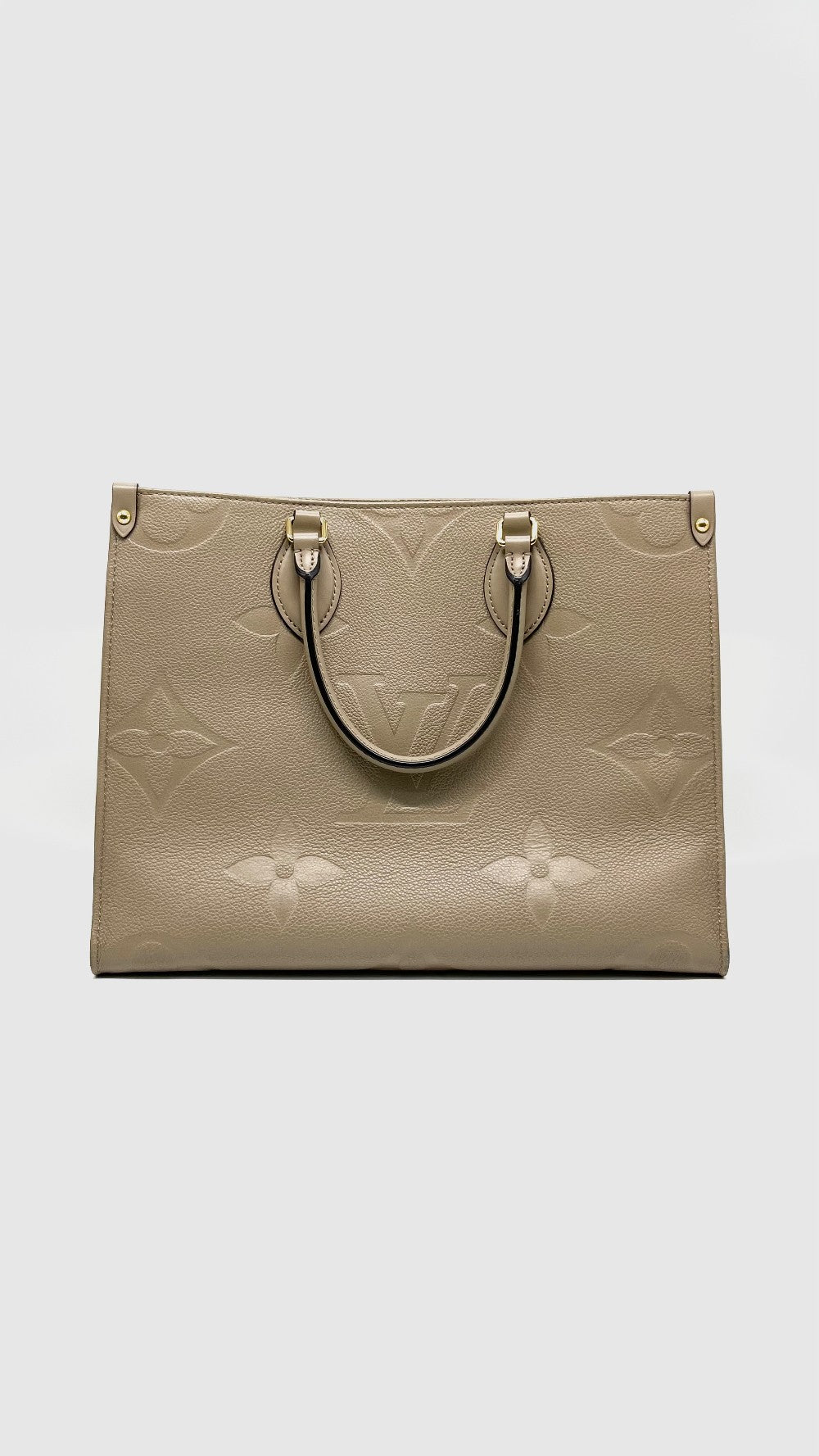 Preowned. LV On The Go MM Empreinte Dove Gray. Microchip|14582
