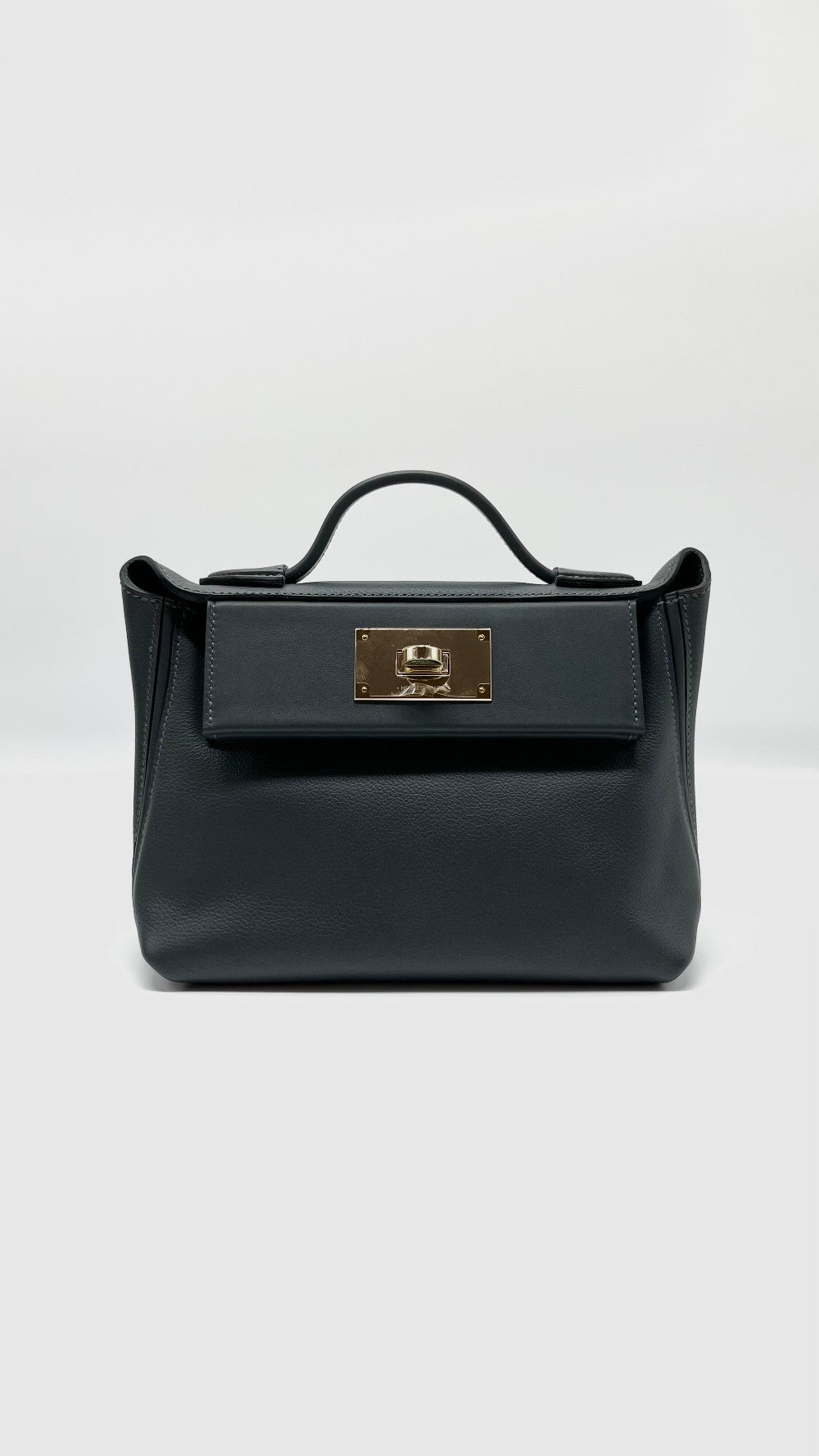 Brand New. Hermes 24/24 21 Evercolor Gris Misty Permabrass HW. WAHT337GM|4998