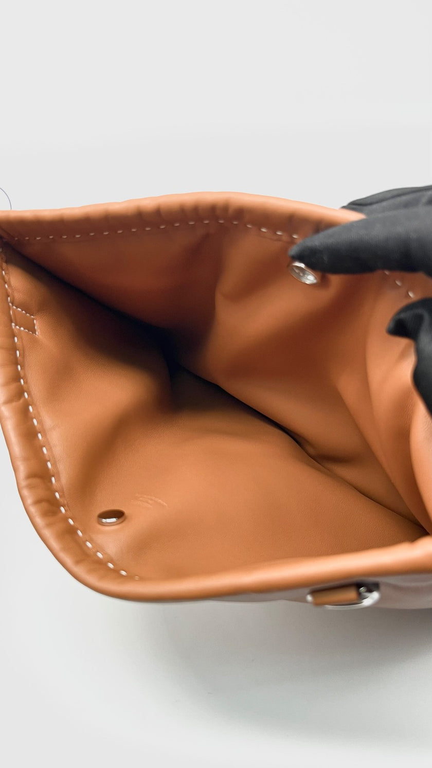 Brand New. Hermes Pilo Pouch Gold Lambskin Swift PHW. KAM004UH|7953