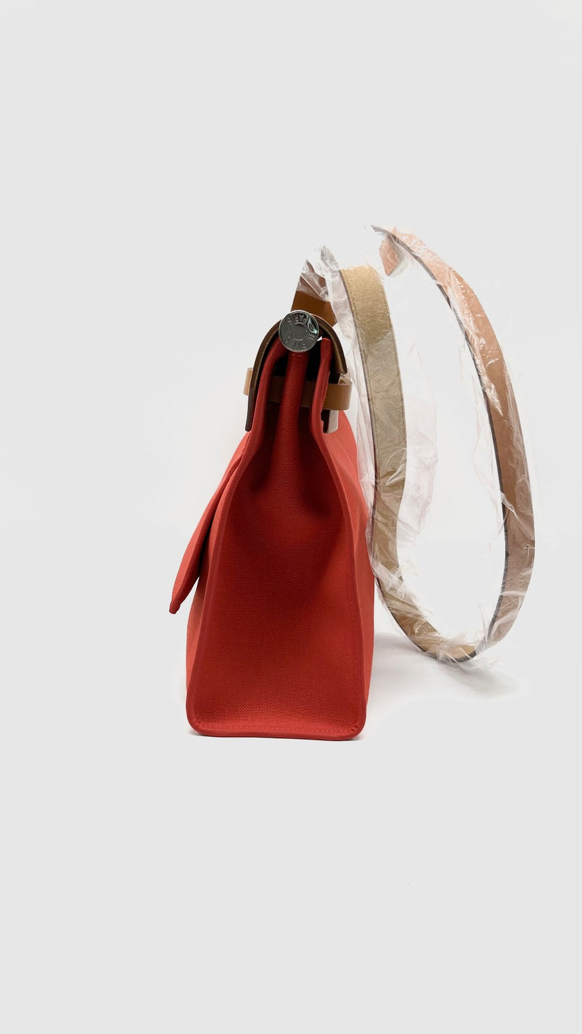 Unused. Hermes Herbag 31 Sanguine Canvas PHW. ATS007AU|15074