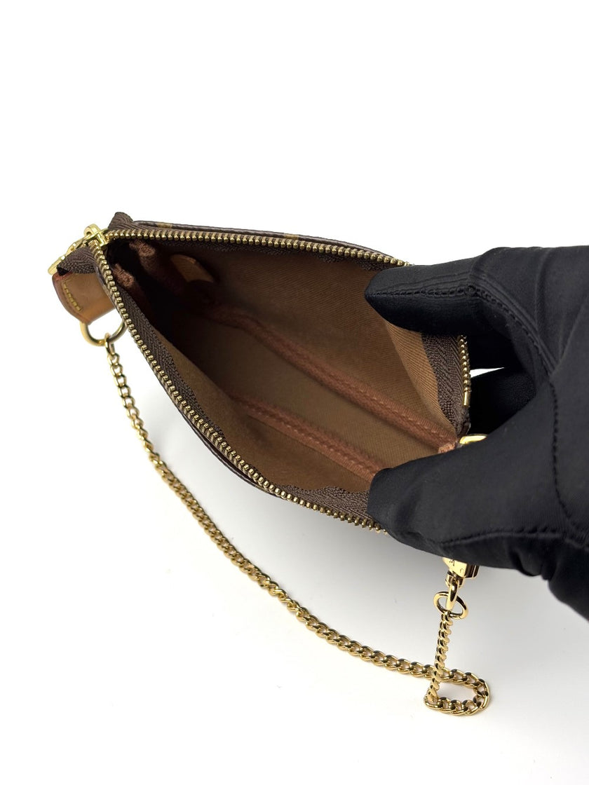 Preowned. LV Mini Pochette Mono. SF4291|6659