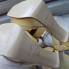 Yves Saint Laurent Tribute in Light Yellow Textured Patent Leather